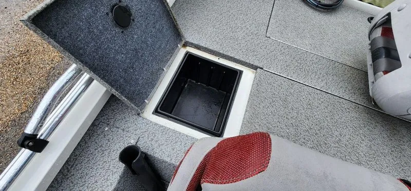 Slide: The Image of 2022 G3 Sportsman 1710 boat with open storage compartment and seating. - 24