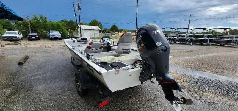 Slide: The Image of 2022 G3 Sportsman 1710 boat with Yamaha outboard motor in parking lot. - 32