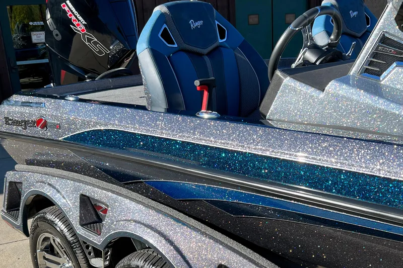 Slide: The Image of 2024 Ranger Z520R Ranger Cup Equipped boat with glittering blue and silver finish. - 1