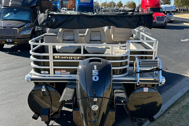 Slide: The Image of 2024 Ranger Reata 223FC pontoon boat with 150 horsepower engine. - 2
