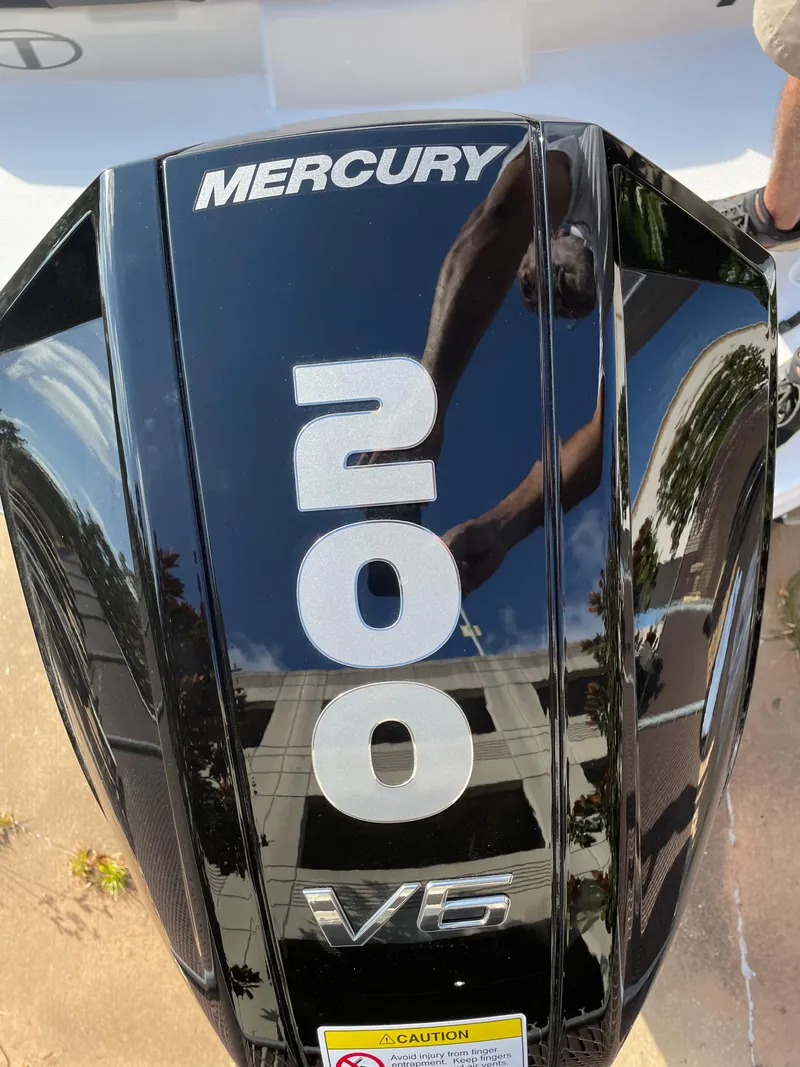 Slide: The Image of Mercury 200 V6 outboard motor on a 2024 Tahoe T21 boat. - 10