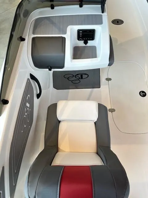 Slide: The Image of 2024 Tahoe T21 boat interior with gray, white, and red seating. - 5