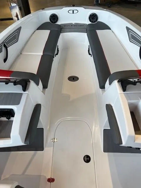 Slide: The Image of 2024 Tahoe T21 boat interior with gray and white seating. - 8