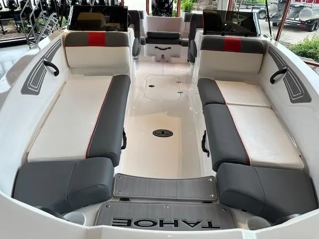 Slide: The Image of 2024 Tahoe T21 boat interior with spacious seating and modern design. - 9