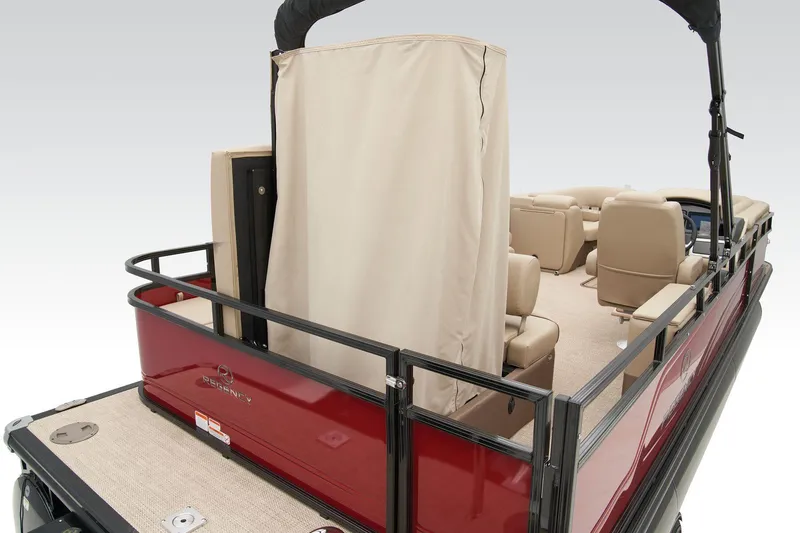 Slide: The Image of 2024 Regency 250 DL3 pontoon boat with beige interior and privacy curtain. - 40