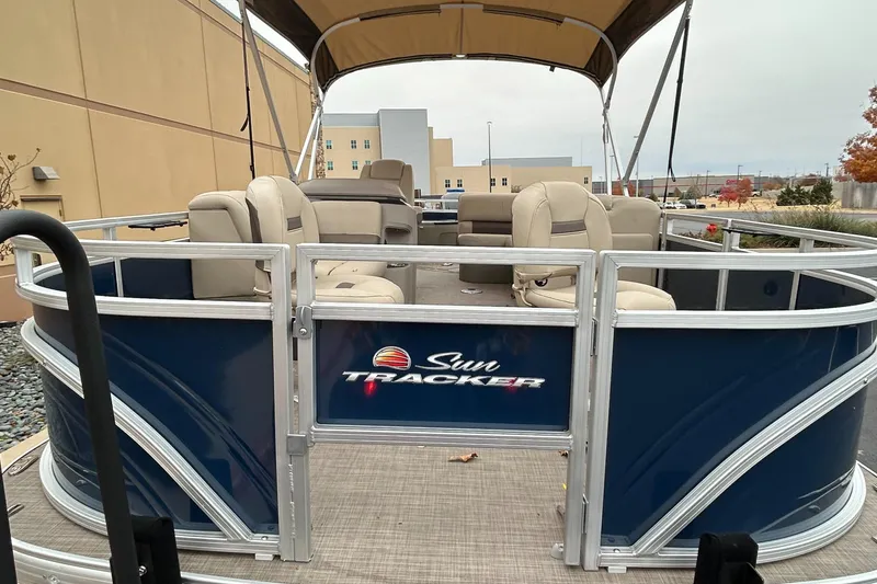 Slide: The Image of 2024 Sun Tracker Fishin' Barge 20 DLX pontoon boat with spacious seating. - 3