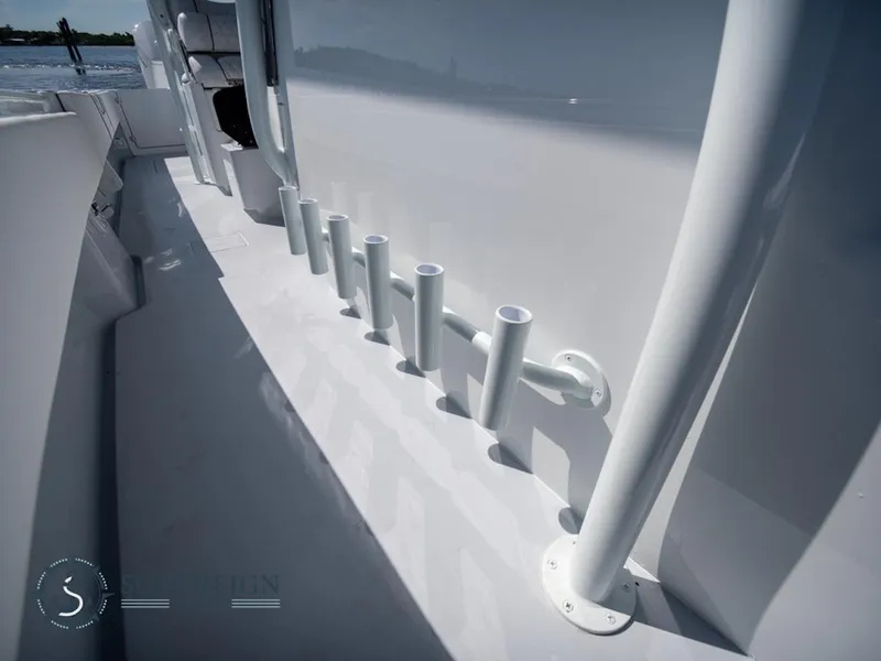 Slide: The Image of 2024 Contender 44 CB boat deck with rod holders. - 33