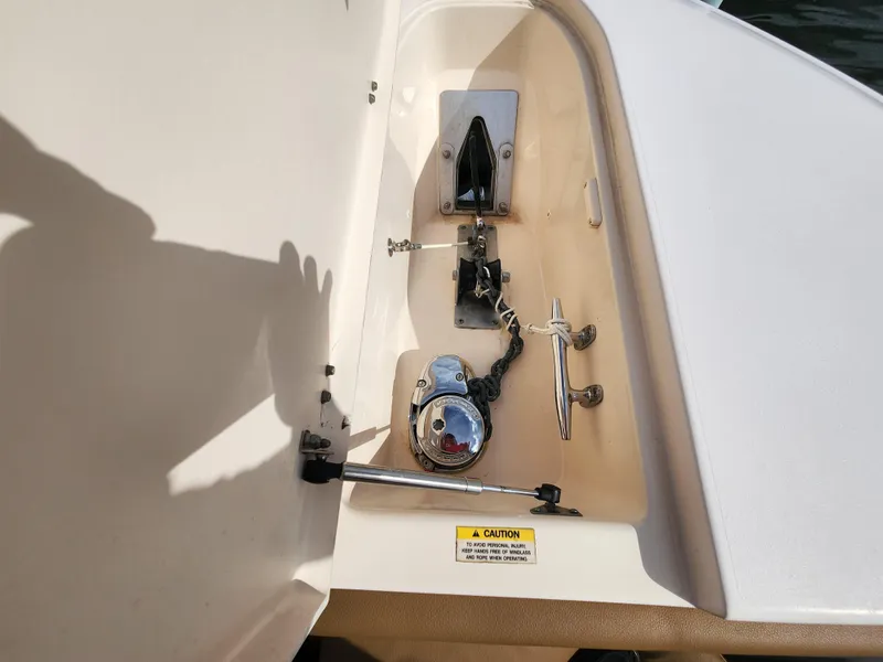 Slide: The Image of Anchor compartment of a 2008 Grady-White 306 Bimini CC boat. - 15