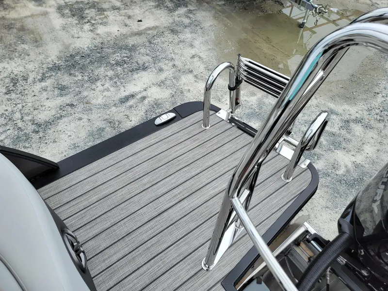 Slide: The Image of 2024 Harris Cruiser 210 boat swim platform with stainless steel ladder. - 26