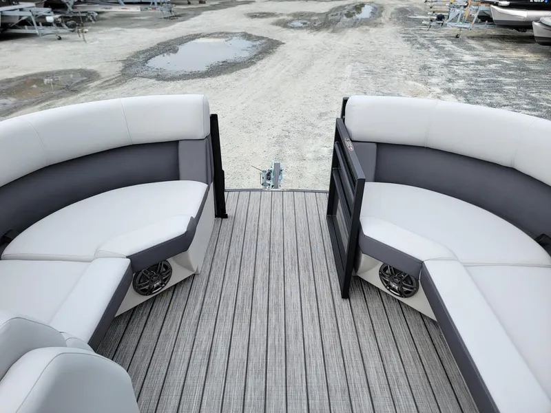 Slide: The Image of 2024 Harris Cruiser 210 boat interior with gray and white seating. - 36