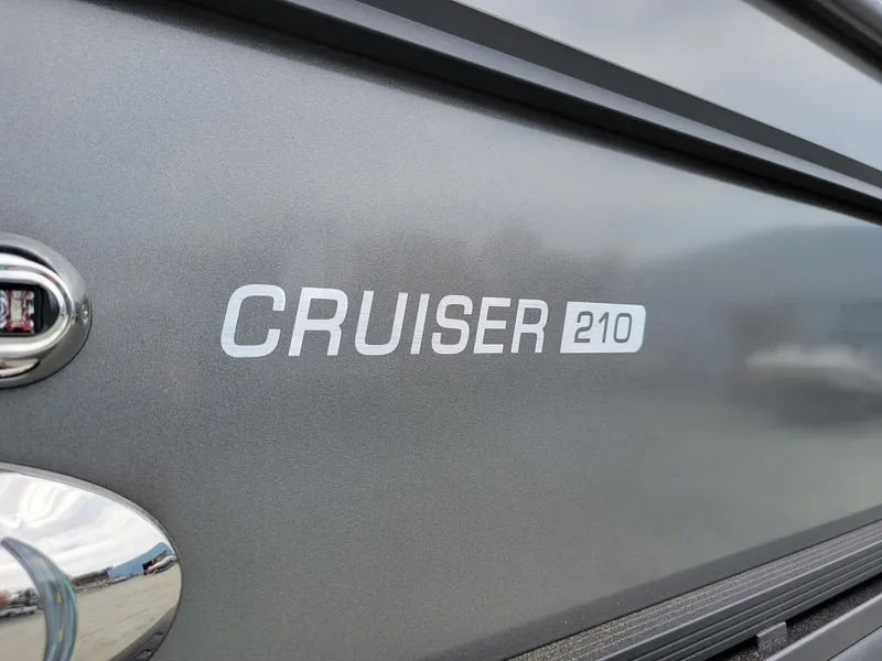 Slide: The Image of 2024 Harris Cruiser 210 boat model close-up. - 39