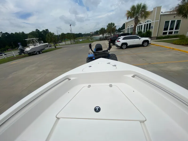 Slide: The Image of 2024 Key West 189 FS boat on a trailer in a parking lot. - 16