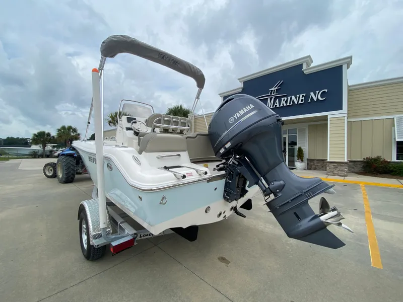 Slide: The Image of 2024 Key West 189 FS boat with Yamaha outboard motor at Marine NC dealership. - 3