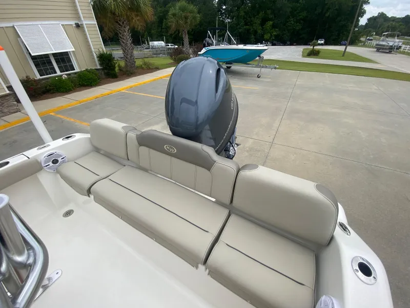 Slide: The Image of 2024 Key West 189 FS boat with rear seating and outboard motor. - 6