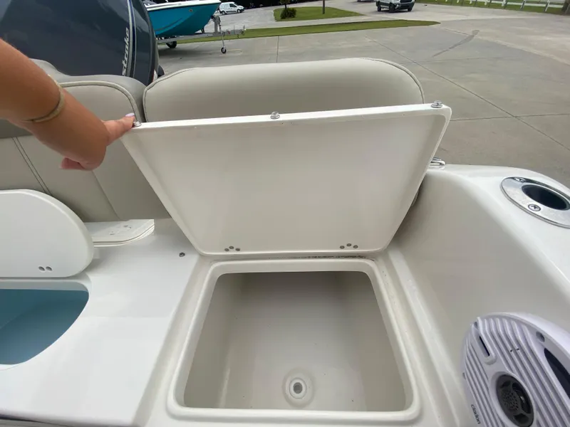 Slide: The Image of 2024 Key West 189 FS boat storage compartment with open lid. - 8