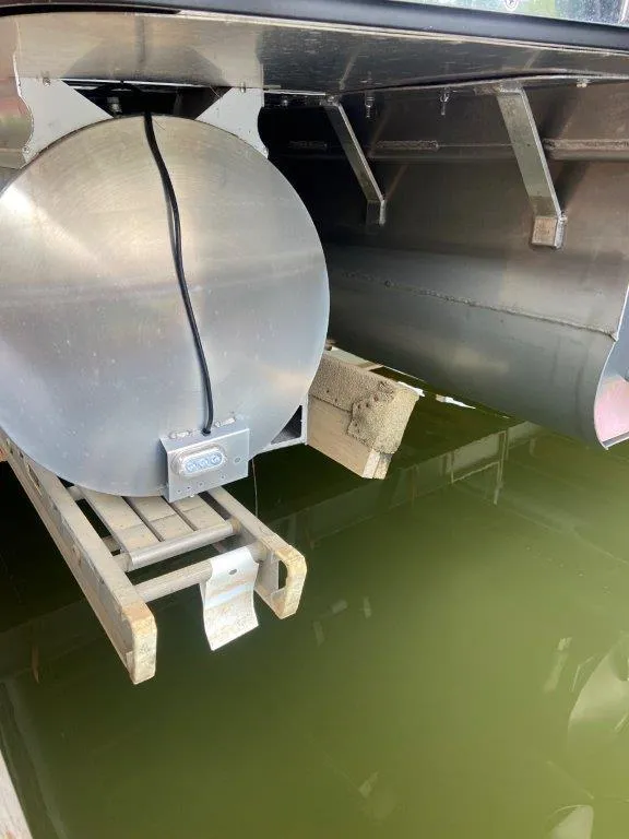 Slide: The Image of 2023 Harris FloteBote 250 Grand Mariner pontoon underside with water reflection. - 23