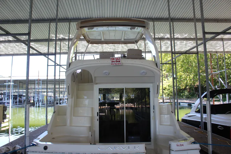 Slide: The Image of 2009 Carver 36SS yacht for sale in covered marina. - 12