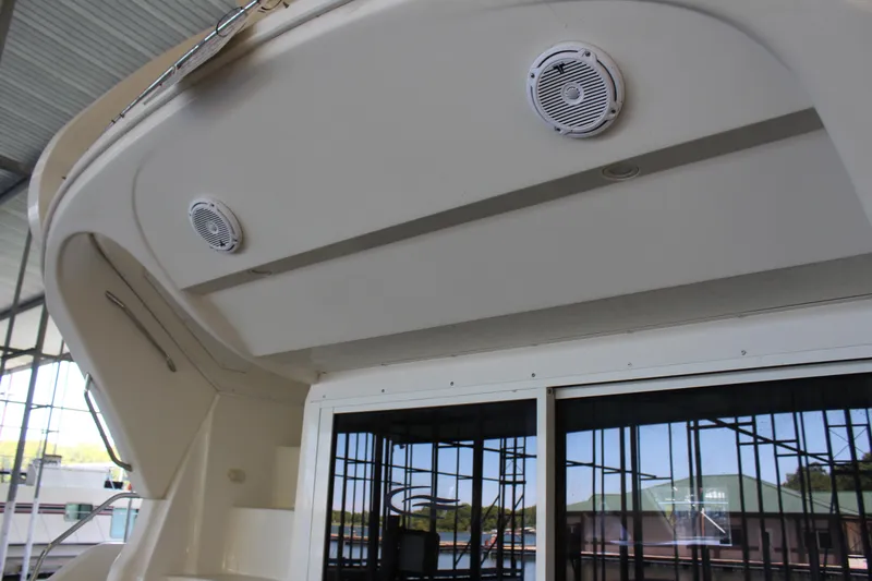 Slide: The Image of 2009 Carver 36SS yacht with exterior speakers and sliding glass door. - 16