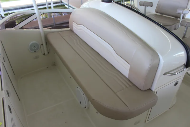 Slide: The Image of 2009 Carver 36SS boat interior with beige seating. - 18