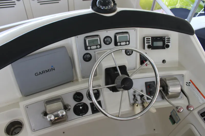 Slide: The Image of Control panel of a 2009 Carver 36SS boat with Garmin navigation system. - 21