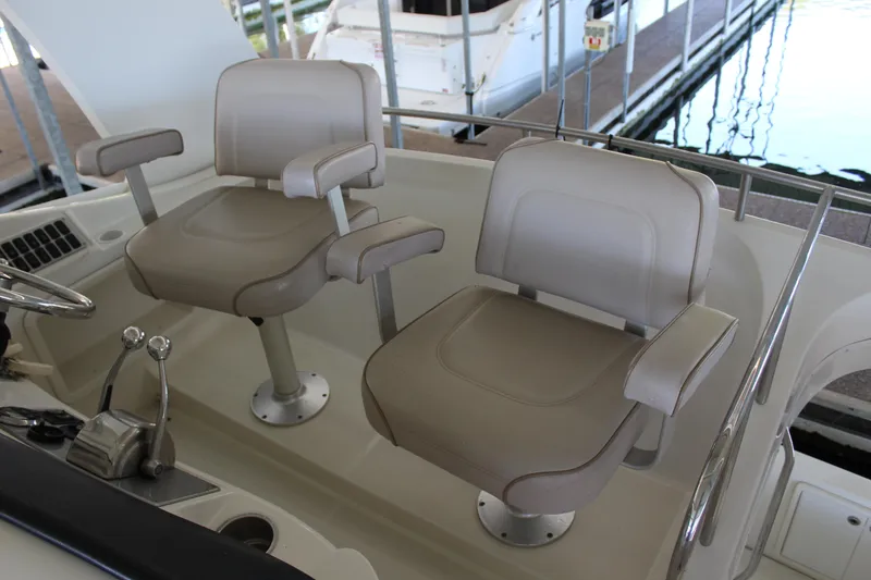 Slide: The Image of Captain's chairs on a 2009 Carver 36SS yacht. - 24