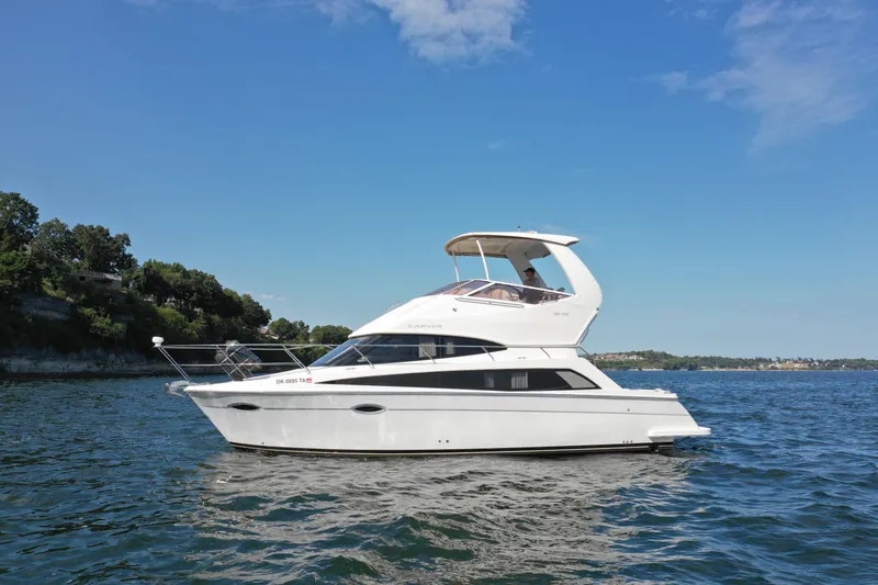 Slide: The Image of 2009 Carver 36SS yacht cruising on a sunny day. - 3
