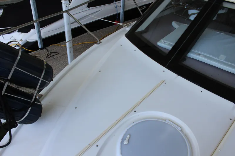 Slide: The Image of 2009 Carver 36SS boat deck with hatch and railing. - 30
