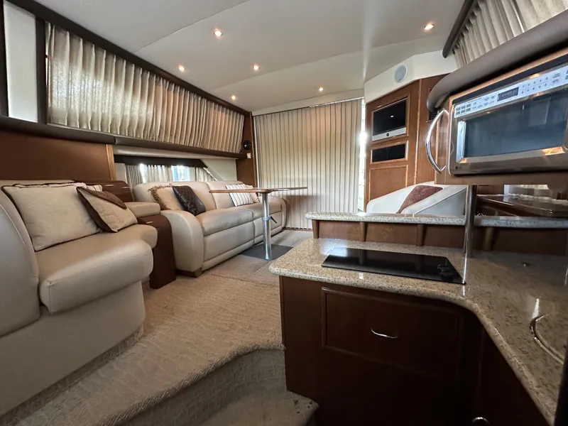 Slide: The Image of Luxurious interior of a 2009 Carver 36SS yacht with modern amenities. - 34
