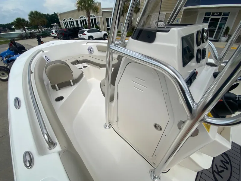 Slide: The Image of 2024 Key West 203 FS boat interior with seating and console. - 13