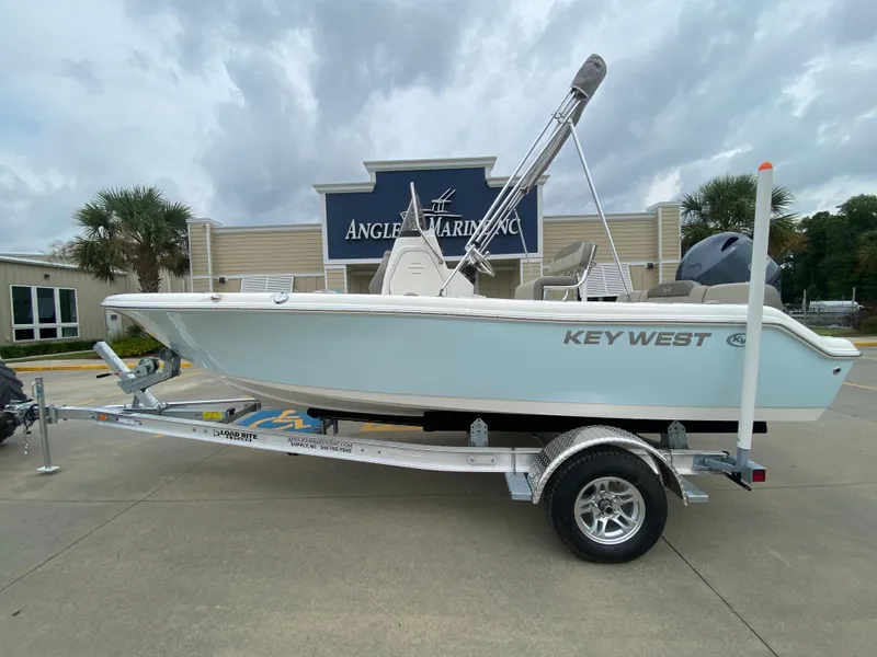 Slide: The Image of 2024 Key West 189 FS boat on trailer at Angler's Marine dealership. - 0