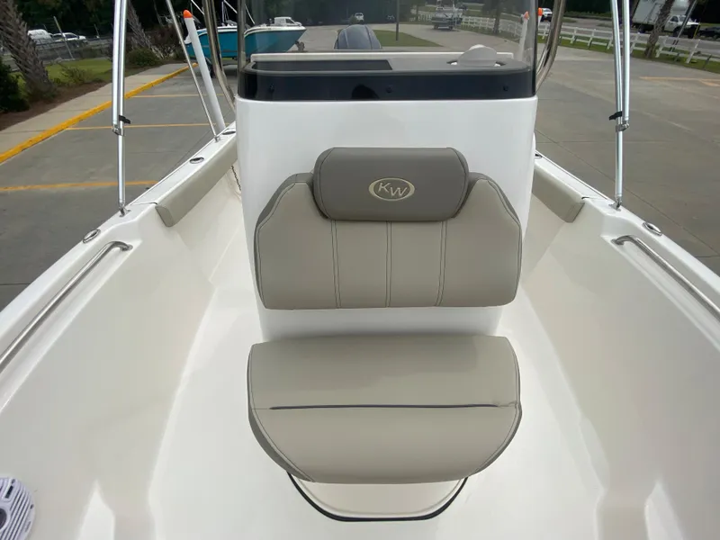 Slide: The Image of 2024 Key West 189 FS boat interior with cushioned seating. - 14