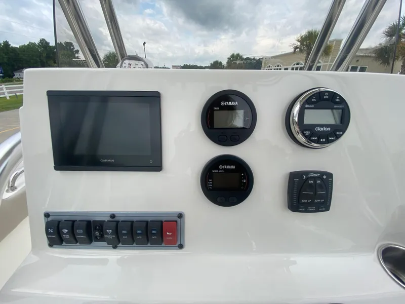 Slide: The Image of Dashboard of 2024 Key West 203 FS boat with Garmin display and control panel. - 10