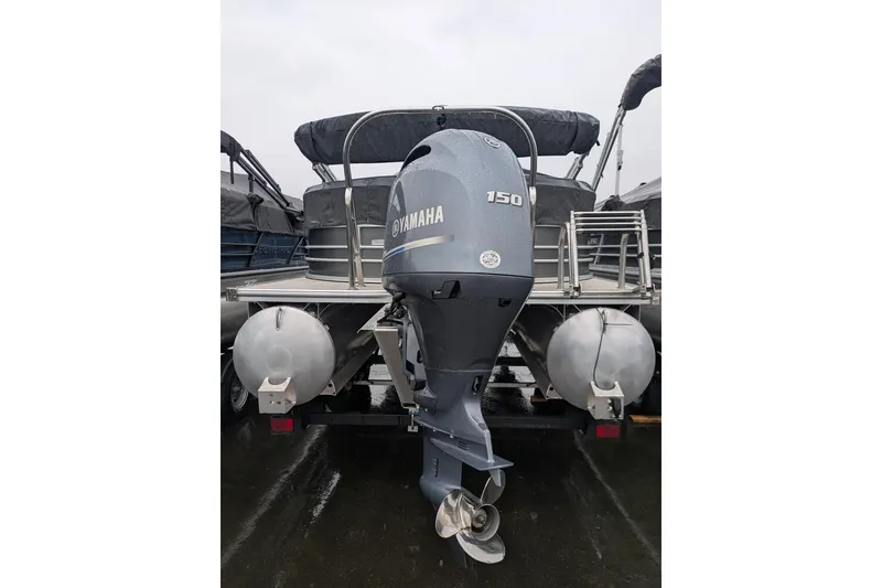 Slide: The Image of 2023 Berkshire 24 RFX LE pontoon boat with Yamaha 150 outboard motor. - 18