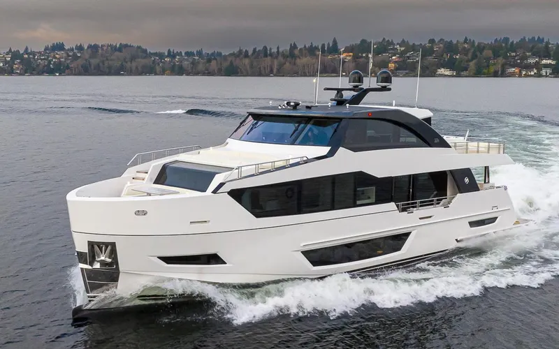 Slide: The Image of 2024 Ocean Alexander Revolution yacht cruising on a lake. - 13