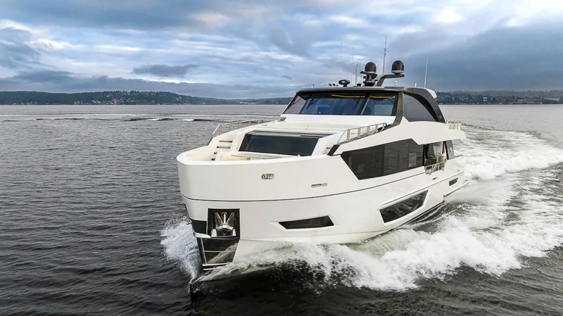 Slide: The Image of 2024 Ocean Alexander Revolution yacht cruising on open water. - 15