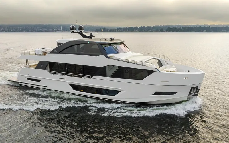 Slide: The Image of 2024 Ocean Alexander Revolution yacht cruising on a calm sea. - 17