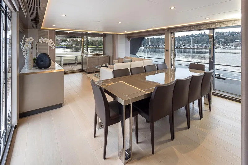 Slide: The Image of Luxurious interior of 2024 Ocean Alexander Revolution yacht with dining area and scenic views. - 25