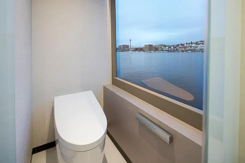 Slide: The Image of Luxury bathroom with waterfront view on 2024 Ocean Alexander Revolution yacht. - 34