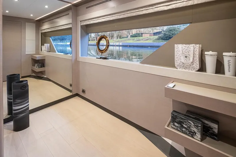 Slide: The Image of Luxurious interior of 2024 Ocean Alexander Revolution yacht with large windows and modern decor. - 44