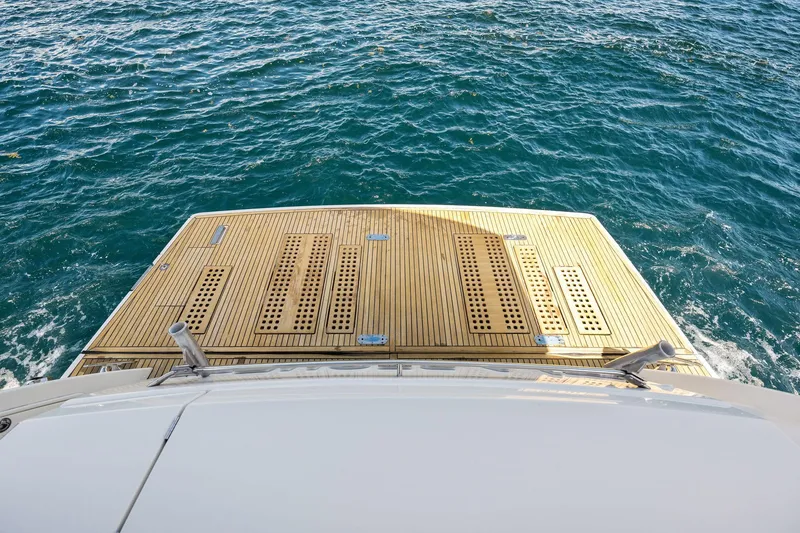 Slide: The Image of Prestige 620 2016 yacht stern platform on blue ocean water. - 14