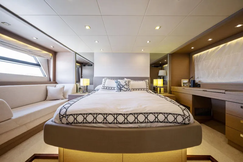 Slide: The Image of Luxurious bedroom interior of 2016 Prestige 620 yacht with modern decor and ample lighting. - 29