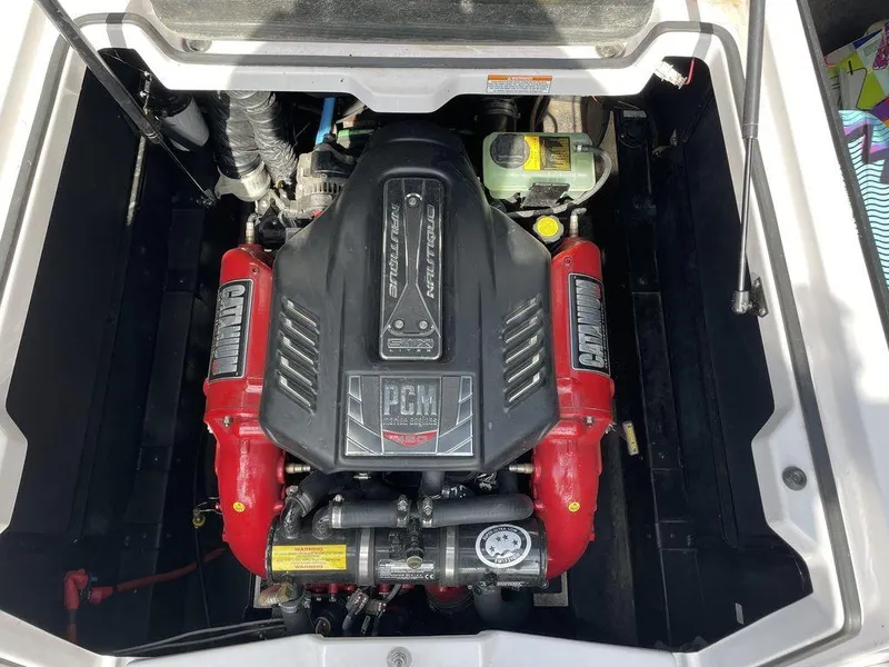 Slide: The Image of 2015 Nautique G23 engine compartment with PCM marine engine. - 7
