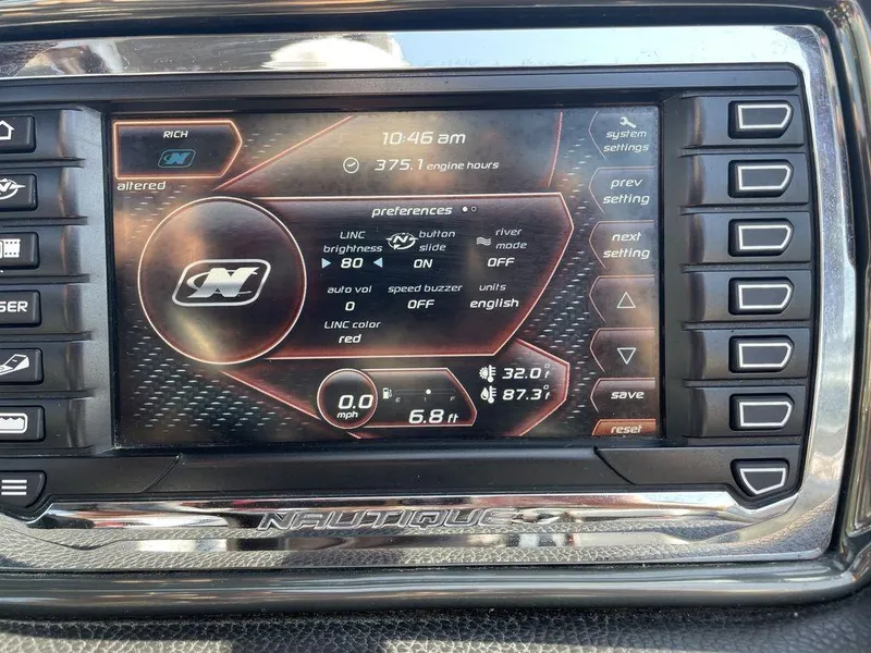 Slide: The Image of 2015 Nautique G23 dashboard display showing system settings and preferences. - 8