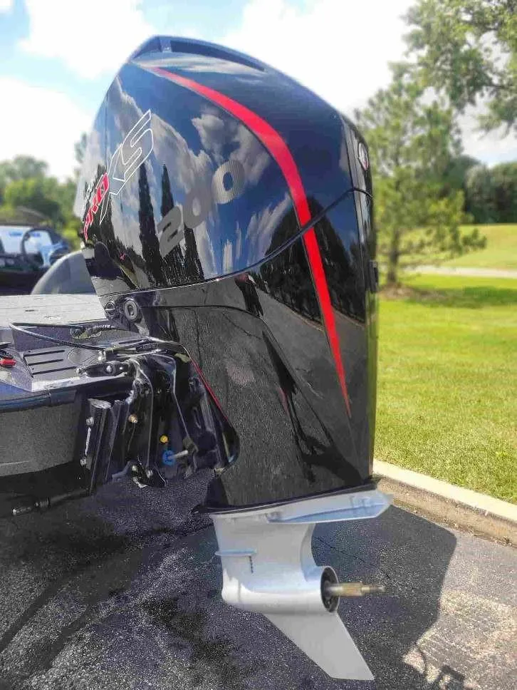 Slide: The Image of 2024 Ranger Z518 Ranger Cup Equipped boat with powerful outboard motor. - 4