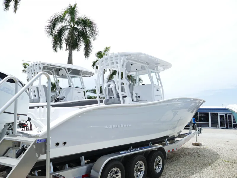 Slide: The Image of 2024 Cape Horn 31T Tournament boat on a trailer, ready for transport. - 0