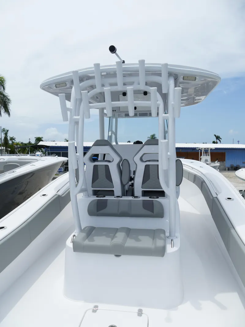 Slide: The Image of 2024 Cape Horn 31T Tournament boat with T-top and dual helm seats. - 10