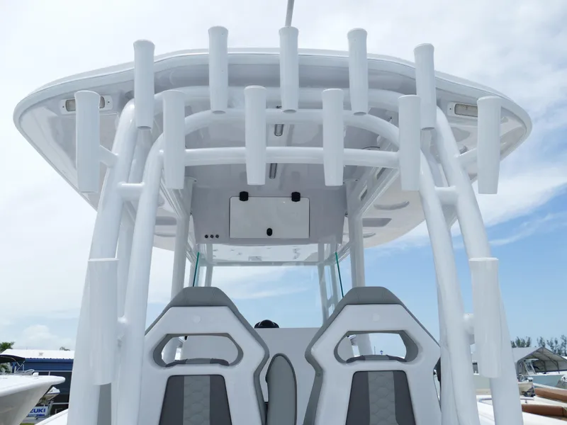 Slide: The Image of 2024 Cape Horn 31T Tournament boat with dual seats and rod holders. - 12