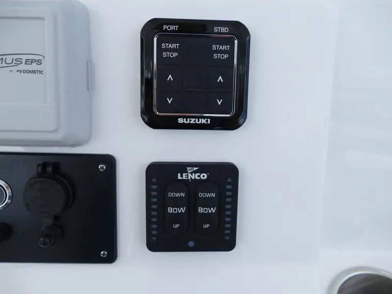 Slide: The Image of 2024 Cape Horn 31T Tournament boat control panel with Suzuki and Lenco systems. - 17