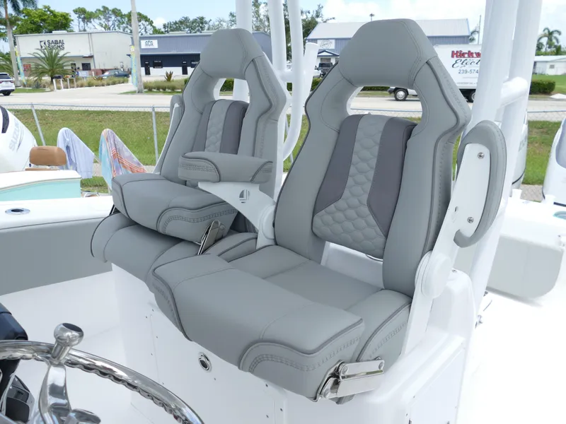 Slide: The Image of 2024 Cape Horn 31T Tournament boat with dual gray captain's seats. - 19