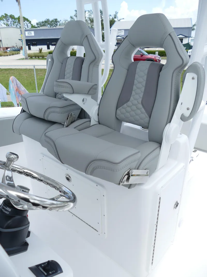 Slide: The Image of 2024 Cape Horn 31T Tournament boat with dual captain's chairs and modern helm. - 20